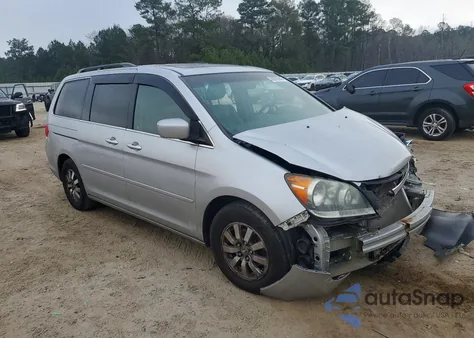 2010 Honda Odyssey Exl z USA, uszkodzony, nr VIN 5FNRL3H63AB050385